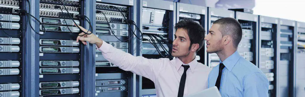 ACC Telecom Hardware Technicians engaging in a conversation about voice and data servers in Maryland.