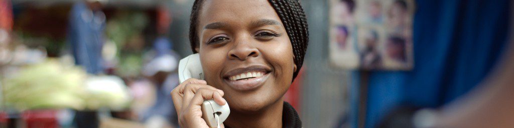 Woman calling on IP telephone in Alexandra township