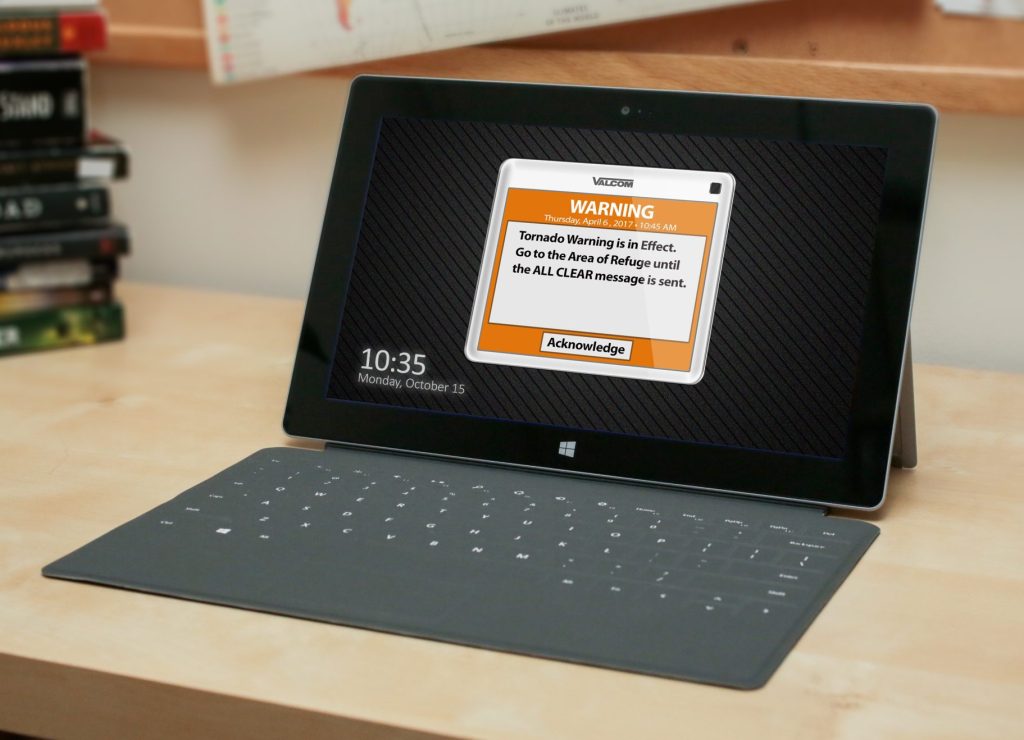 Valcom mass notification message on laptop computer showing a pop-up Tornado message warning and further instructions.